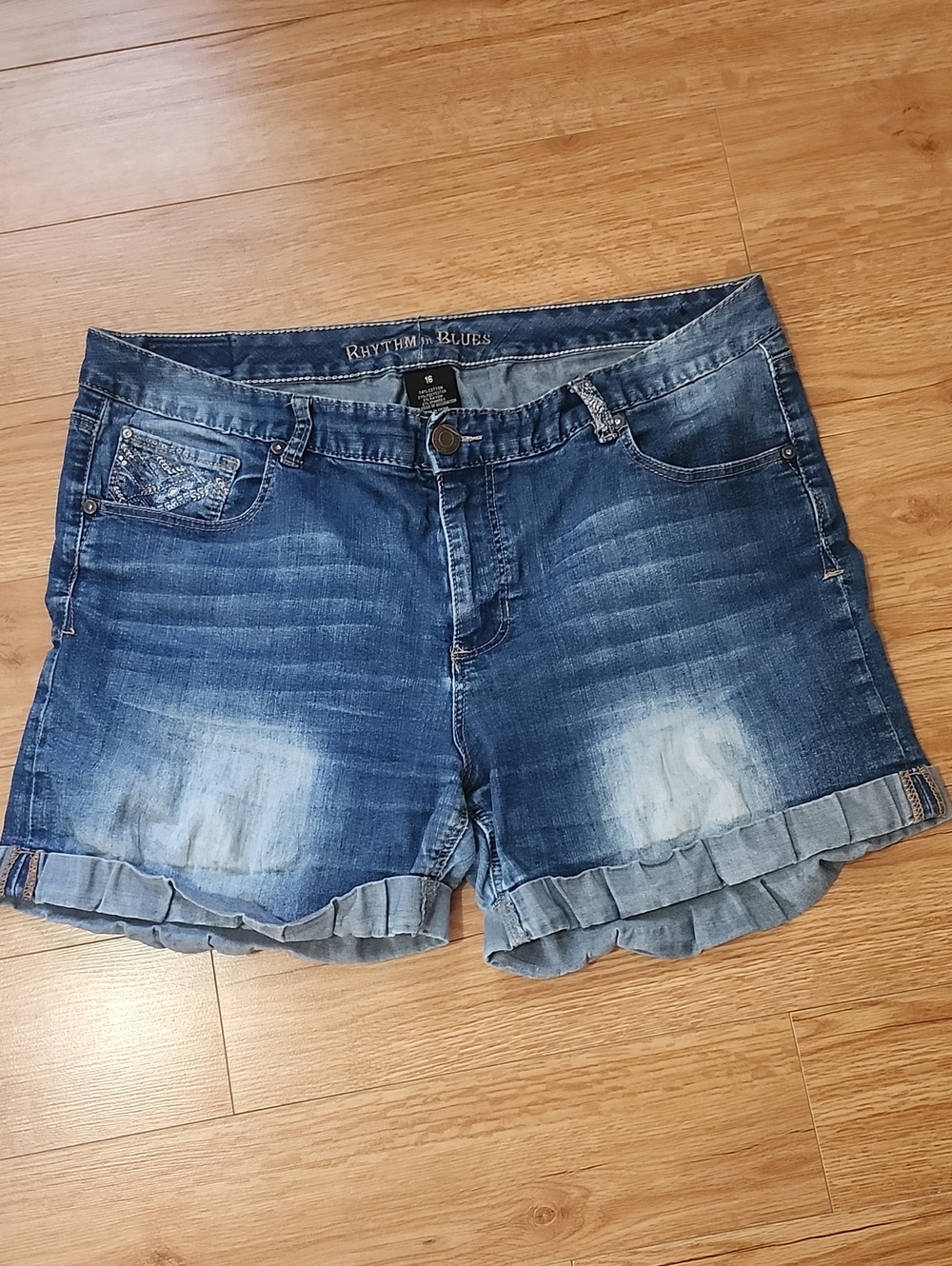 Distressed Blue Denim Ruffle Hem Shorts